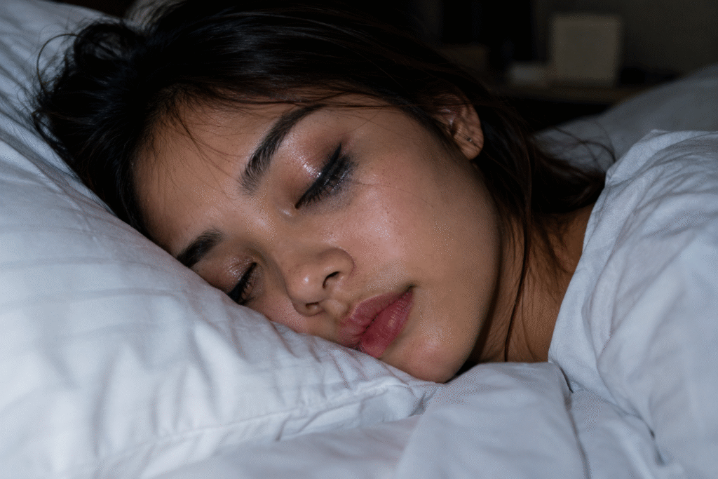 Photo of a woman sleeping with makeup on